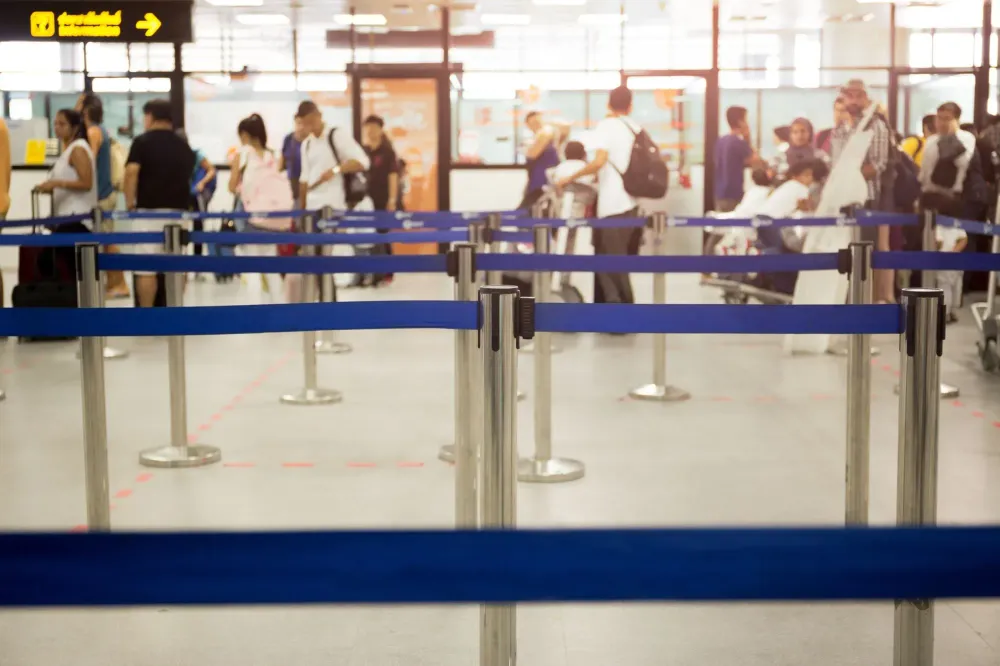 People waiting in airport security line